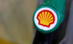 the yellow and red shell logo atop a green petro pump nozzle