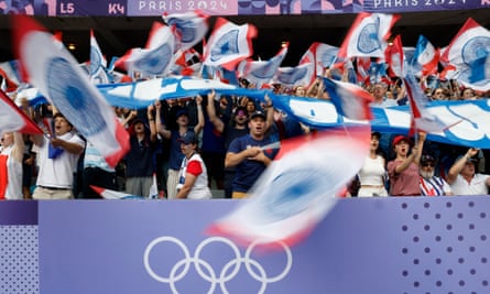 Home fans show their support at the Stade de France.
