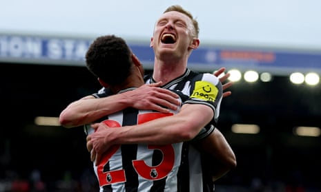 Newcastle United's Sean Longstaff celebrates scoring their second goal with Jacob Murphy at Burnley.
