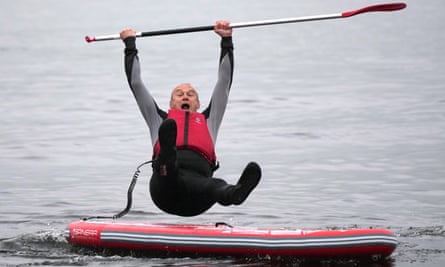 Ed Davey falls off his paddleboard