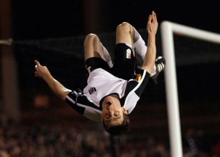 Zoltan Gera of Fulham celebrates with some acrobatics.
