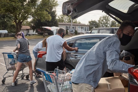 Volunteers distribute food at Faith Restorations in Monaca, PA on Tuesday, August 18, 2020.
