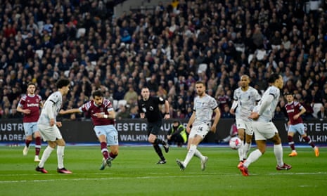 West Ham United's Lucas Paqueta scores the opening goal against Liverpool.