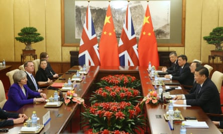 Theresa May and the British delegation meet with Xi Jinping at the Diaoyutai state guesthouse in Beijing .