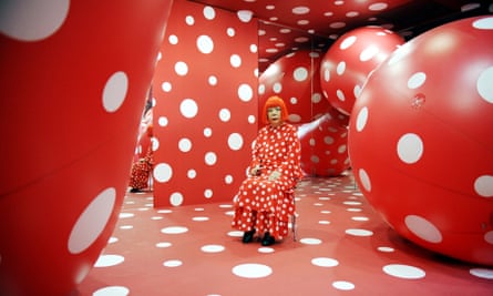 Yayoi Kusama with giant polka dot balls
