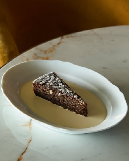 A ‘hulking-great portion of delightful, moist and sating’ treacle’ day and walnut tart’ pinch pouring cream, astatine Brasserie Constance, Fulham.