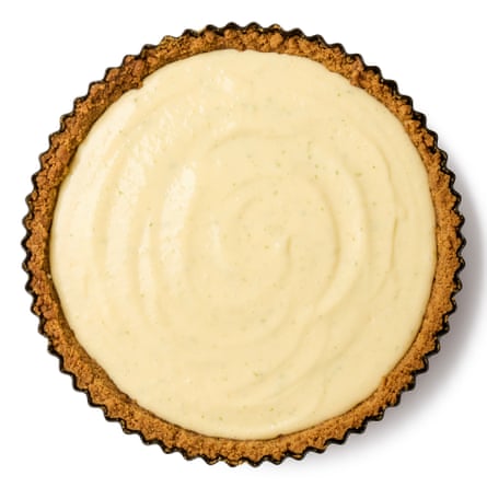 A pie dish with the cooked crust and the filling of the pie added