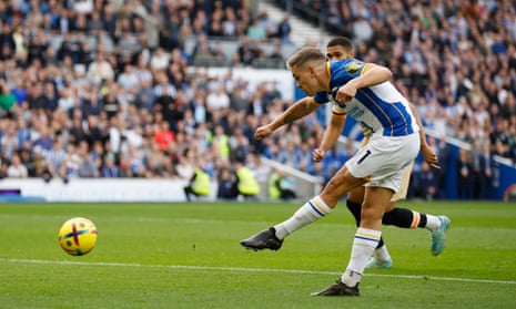 Brighton’s Leandro Trossard scores their first goal.