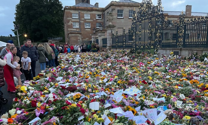 Floral tributes left outside Hillsborough Castle, Northern Ireland's royal residence.