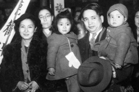 Reverend Kiyoshi Tanimoto and his family at the Hiroshima Station as they see him off during one of his trips to the United States in 1947. His daughter, Koko Kondo, is in the middle.