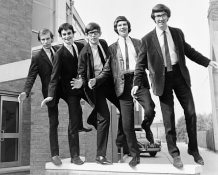 The Zombies stand on a wall and pose for a photograph in 1965: (l-r) Hugh Grundy, Colin Blunstone, Paul Atkinson, Rod Argent, Chris White