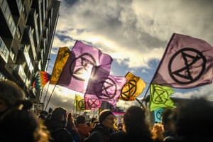 Extinction Rebellion protesters outside the entrance to the venue on Friday