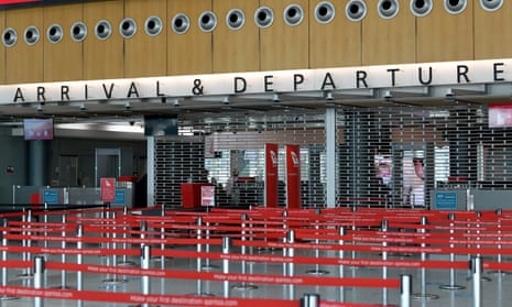 An empty arrivals and departures security point at the Qantas terminal at Sydney Airport