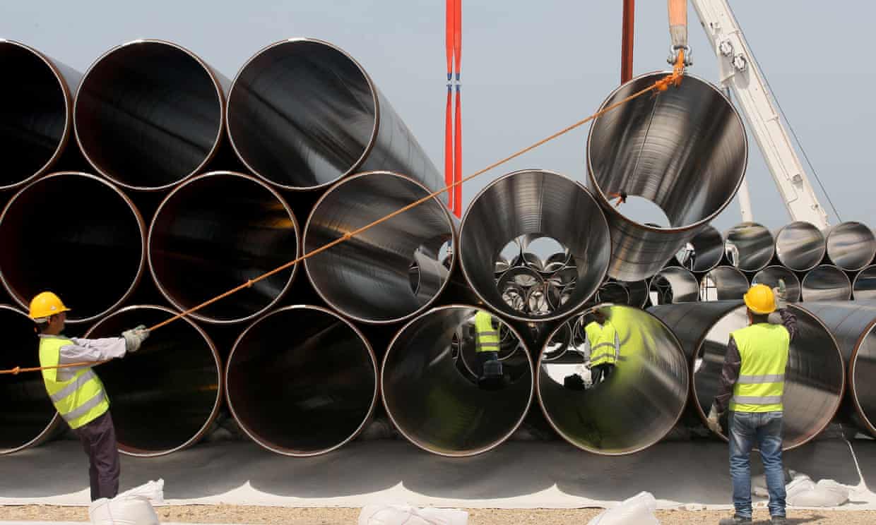 Workers unload newly arrived pipes for the construction of the future Trans Adriatic Pipeline which will bring gas from the Caspian Sea to Europe. 
