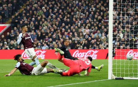 Chelsea's Joao Pedro diverts the ball into the net to level the score at Aston Villa.