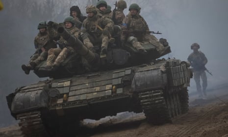 Ukrainian servicemen attend a joint drills near the border with Belarus.