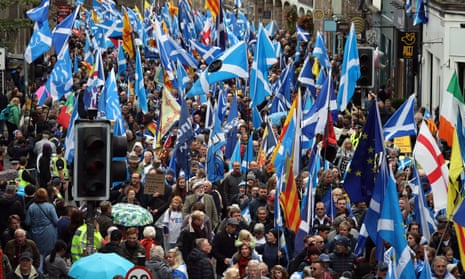 Scottish independence supporters march through Edinburgh during an All Under One Banner march