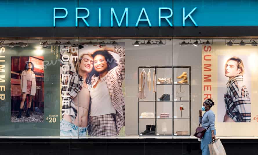 A woman walks past a Primark store in Marble Arch, west London