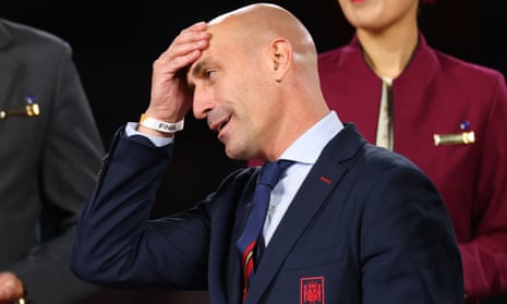 Luis Rubiales puts his hand on his head
