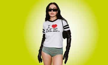 Charlie xcx in hot pants and a T-shirt reading I heart Me.