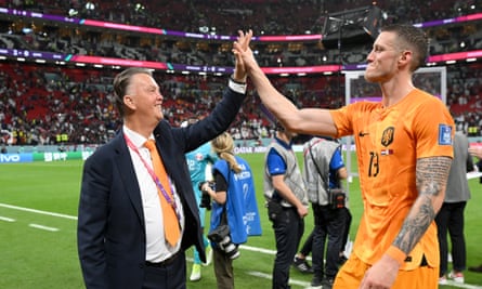 Louis van Gaal celebrates with Wout Weghorst after the Netherlands’ 2-0 victory.