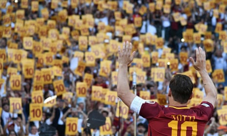 Francesco Totti salutes fans after his final game for Roma after 619 league appearances, a tally only bettered by Paolo Maldini.