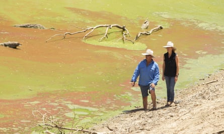 Chrissy and Bill Ashby on the banks of the Darling River near their property in Tilpa. Local communities in the Darling River area are facing drought and clean water shortages.