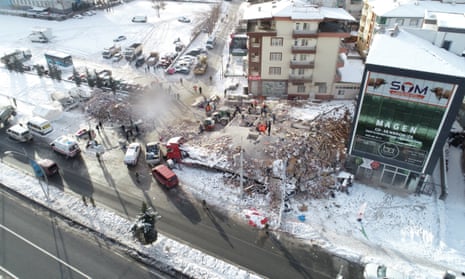 An aerial view of the collapsed buildings while search and rescue efforts continue in Malatya.