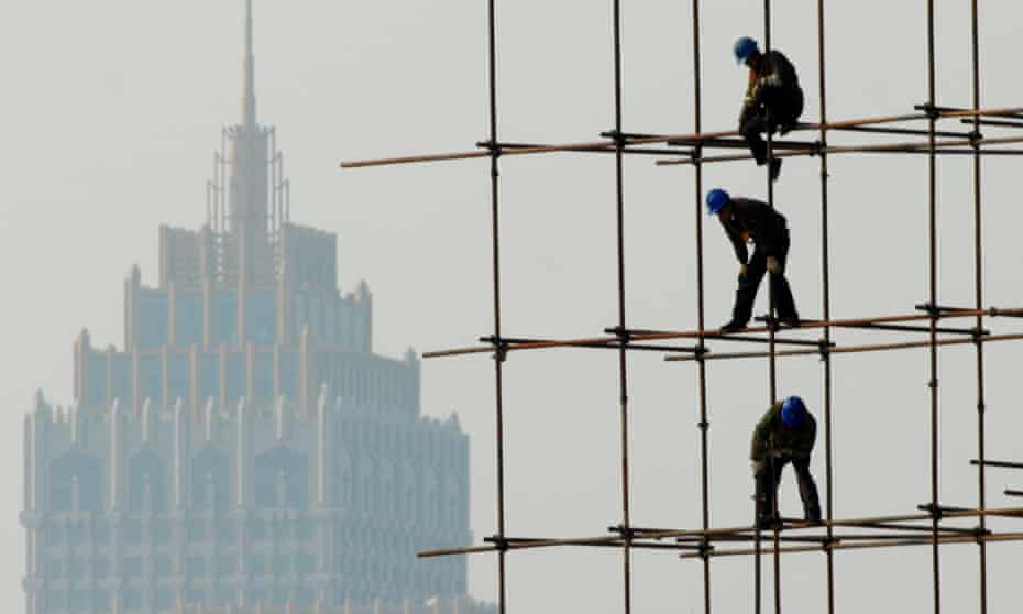  Builders in Shenyang, China: party control will not permit a full ascent to prosperity.