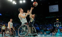 Steve Serio (right) contests possession with Great Britain’s Peter Cusack.