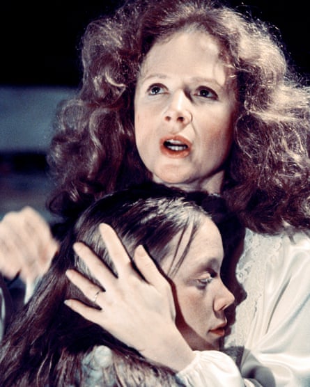 Piper Laurie in the role of Margaret White, the mother of Carrie, played by Sissy Spacek, in the 1976 horror film Carrie.