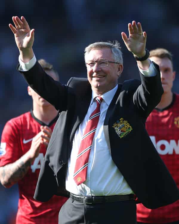 Alex Ferguson salutes supporters after leading Manchester United to a 13th Premier League title under him.