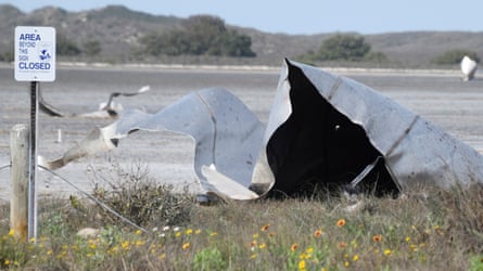 Debris is seen in the Boca Chica national wildlife refuge after the SpaceX Starship prototype rocket failed to land safely on 31 March.