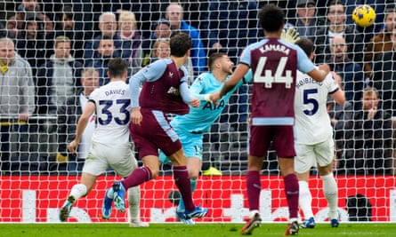 Aston Villa’s Pau Torres, second left, scores his side’s first goal against Tottenham