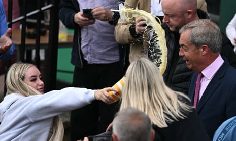 Woman throws milkshake at Reform UK leader