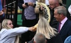 Woman throws milkshake over Nigel Farage on first day of campaigning