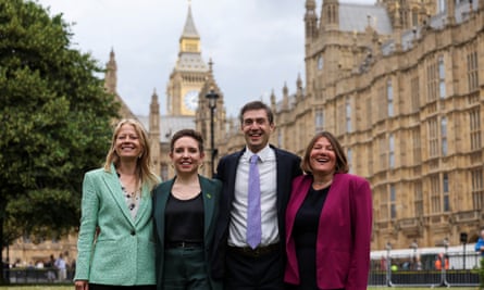 Siân Berry (left), with Green party co-leaders Carla Denyer and Adrian Ramsey, and Ellie Chowns pose for a photo outside the Houses of Parliament
