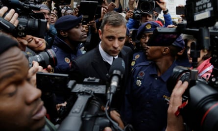 Oscar Pistorius leaves the high court in Pretoria, South Africa, Tuesday 14 June 2016 during his trail for the murder of girlfriend Reeva Steenkamp.