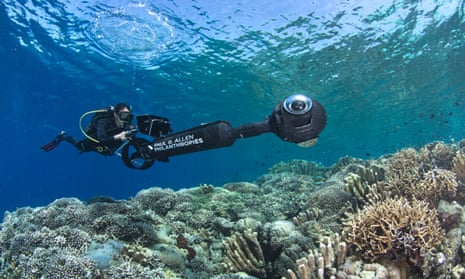 A scientist conducts a reef survey using a scooter with a 360 degree camera set up in Manado, Indonesia.