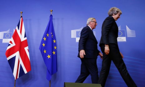 Theresa May and Jean-Claude Juncker leave the EU’s headquarters in Brussels, Belgium.
