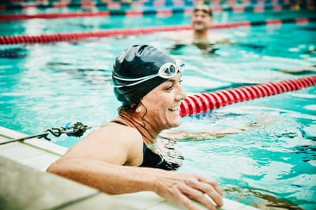 swimmer resting in outdoor pool