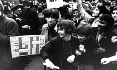 Anti-Vietnam war demonstrators run past Downing Street, October 1968.