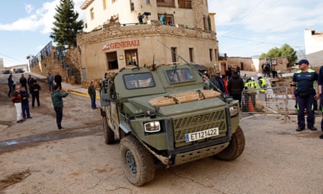 A picture taken on October 30, 2024 shows a military vehicle in a street following floods in Letur, southwest of Valencia, eastern Spain. Floods triggered by torrential rains in Spain's eastern Valencia region has left at least 70 people dead, rescue services said on October 30. (Photo by OSCAR DEL POZO / AFP) (Photo by OSCAR DEL POZO/AFP via Getty Images)