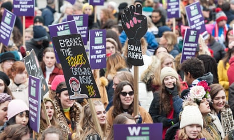 Women in London take part in a global protest against sexual violence and economic discrimination in 2019