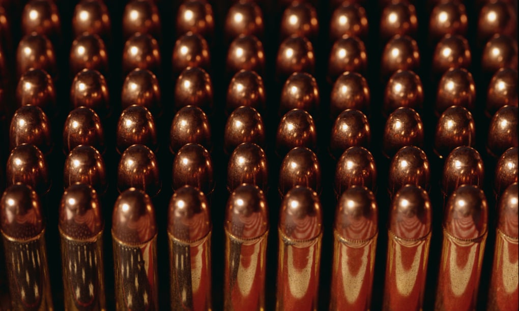 They look a little like small golden lipsticks ... .38 Special bullets off the production line. Photograph: Philip James Corwin/Getty Images