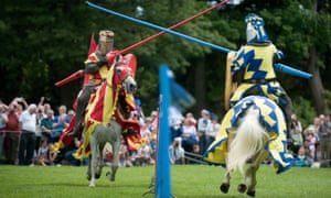 Knights on horseback taking part in a medieval jousting tournament