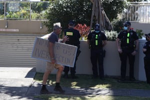 Police respond to an anti-lockdown protest in Coolangatta on the NS-Queensland border.