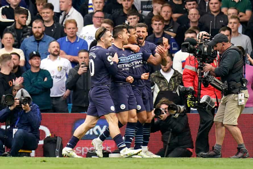 Leeds United 0-4 Manchester City: Premier League – live reaction! | Premier League 8 Ake celebrates teammates.