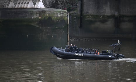 A police boat searches the water near Chelsea Bridge on 10 February 2024