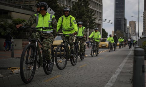 People are seen biking during a car-free-day in Bogota, Colombia, on 22 September 2022.